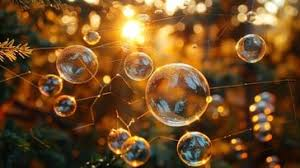 Bubble floating on the air backlite with a golden sunset.